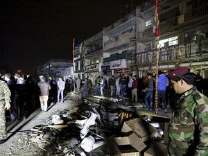 Security forces inspect the aftermath of deadly attack carried out by Daesh in a mall in Baghdad. (Hindustan Times) 