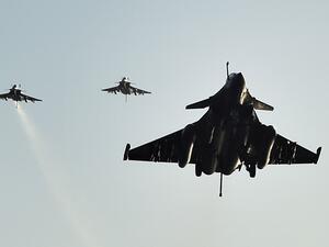 French Rafale fighter jets return after air strikes against Daesh. (AFP/Anne-Christine Poujoulat) 