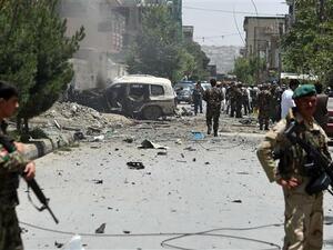 Afghan security forces stand alert at the site of a bomb blast that targeted NATO forces. (AFP/File) 