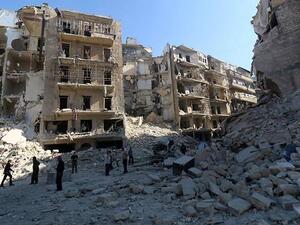 More than 220,000 people have been killed in Syria in four years of conflict, according to the Syrian Observatory for Human Rights. (AFP/Zein al-Rifai)