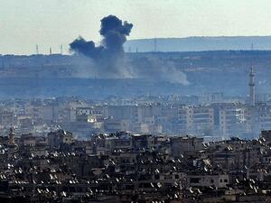Smoke billows from the southern suburbs of Aleppo during fighting between regime forces and rebel fighters on December 3, 2016. (AFP/George Ourfalian)