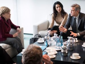 Amal Clooney and husband George meet Angela Merkel at the Federal Chancellery in Berlin. (Guido Bergmann, BPA , EPA)