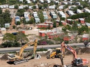 Preparatory work is carried out on a construction site in the Ariel settlement in September this year. (AFP/Jack Guez)