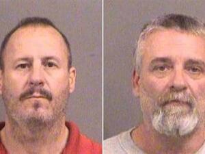 This photo released by police shows Curtis Allen (L) and Gavin Wright who are reported to be part of a militia group called the Crusaders, which first drew the FBI's attention last February.