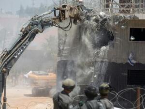 Jewish settlers in the occupied West Bank and East Jerusalem, who number between 500,000 and 600,000, receive four times as many housing units as Palestinian citizens in Israel. (AFP/File)