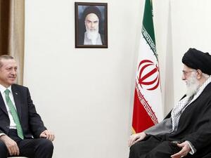 A handout picture released by the official website of Iran’s supreme leader, Ayatollah Ali Khamenei, shows him, right, meeting with Turkish Prime Minister Recep Tayyip Erdoğan in Tehran, Iran, on January 29, 2014. (AFP/HO/Iranian Supreme Leader’s Website)