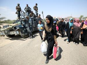 Despite plans before the operation for safe corridors, few civilians have managed to flee the Fallujah battle in recent days. (AFP/Ahmad al-Rubaye)
