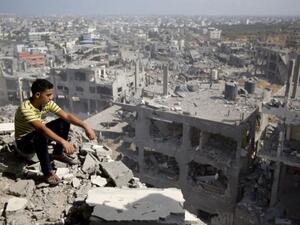 A young Palestinian overlooks Gaza city. (AFP/File)