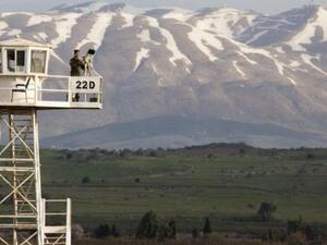 Watchtower: A UN peacekeeper on an observation tower on the Golan Heights. (AFP/Jack Guez)
