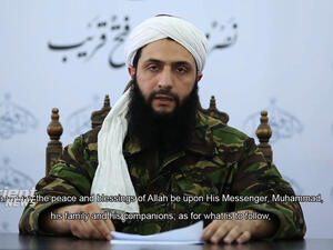 An image grab taken from a video broadcast Thursday by Dubai-based Orient News satellite television shows the head of Nusra Front in Syria, Abu Mohamad al-Jolani, giving a speech from an undisclosed location, in the first-ever video showing his face to be released. Jolani said his group was breaking ties with al-Qaida and changing its Arabic name to Jabhat Fateh al-Sham (Conquest of Syria). (Courtesy photo)