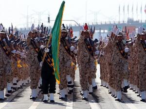 Iranian soldiers from the Revolutionary Guards march during a military parade last month in Tehran. (AFP/File)
