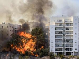 Fires raged through Haifa, causing the city to be evacuated. (AFP/File) 