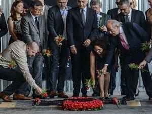 Consuls of European countries lay cloves and roses at the explosion site at Ataturk airport International terminal on July 1, 2016 three days after a suicide bombing and gun attack targeted Istanbuls Ataturk airport, killing 44 people. (AFP/File) 
