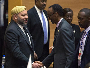 King Mohammed VI of Morocco (left) greets Rwanda's President Paul Kagame. (AFP/File)