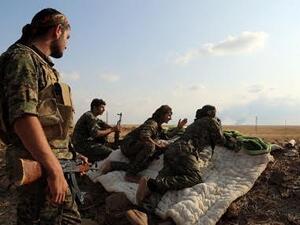 Members of the Syrian Democratic Forces (SDF) at an outpost near Manbij in the north of Syria. (AFP/File)
