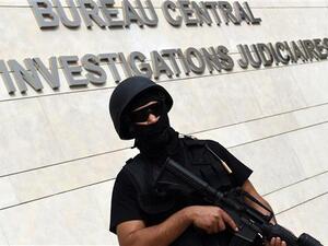 A member of Moroccan special forces stand guard outside the Moroccan Central Bureau of Judicial Investigation (BCIJ) building in the capital, Rabat, on September 14, 2015. (AFP/File)