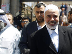 Senior Hamas leader Ismail Haniyeh leaving the mosque after his speech Friday. (AFP/File)