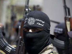Masked Palestinian militants in Beit Lahia, northern Gaza Strip, June 12, 2014. (AFP/File)