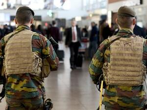 Military police patrol the Brussels Airport in Zaventem, eastern Brussels, November 18, 2015. (AFP/Belga/Dirk Waem)