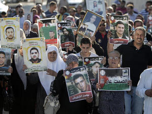 Palestinian protest in support of prisoners on hunger strike, June 2014. (AFP/File)