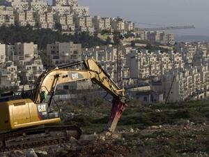 The bill affects some 4,000 homes in the West Bank and stipulates that Israeli settlements found to be illegally built on Palestinian-owned land will not be removed. (File photo)