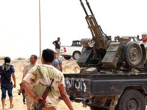 Forces loyal to Libya's UN-backed unity government are seen during clashes with Daesh militants. (AFP/File)