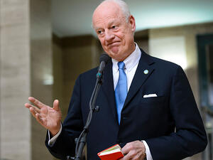 UN envoy for Syria Staffan de Mistura gestures as he speaks to journalists during ongoing peace talks with representatives of the Syrian regime. (AFP/File)