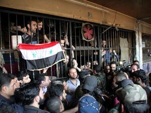 A handout image from the Syrian state news agency shows prison inmates. (AFP/SANA)