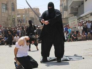 Obese executioner: The 30-stone militant has become infamous as one of Daesh's most feared executioners. (Courtesy photo)
