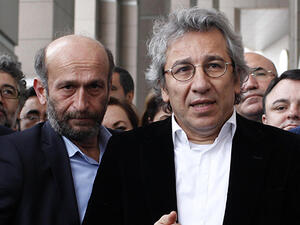 An Istanbul court on Friday jailed Turkish opposition journalists Can Dundar and Erdem Gul for five years 10 months and five years respectively. (AFP/File)