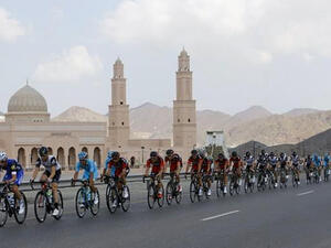 The pack rides during the first stage of the 7th cycling Tour of Oman between Oman Exhibition Center and al-Bustan. (AFP/file)