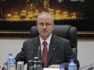 President Abbas has formally accepted the resignation of newly appointed PM Rami Hamdallah (file AFP)