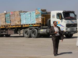 A truck loaded with aid parcels provided by Turkey waits at the Kerem Shalom crossing near Rafah after entering the southern Gaza Strip from Israel on July 4, 2016. (AFP/Said Khatib)