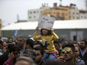 Palestinians at a protest against wage cuts for civil servants, Gaza City, 8 April 2017. (AFP/Mahmud Hams)