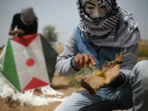 Palestinians have sent Incendiary kites and balloons that caused fire in several places in Israel. (AFP/ File)