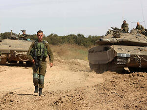 IDF forces operating along the Gaza border (AFP)