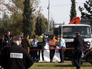 Israeli security forces and medics gather at the site of a ramming attack in Jerusalem. (AFP/File)