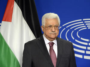 Palestinian Authority President Mahmoud Abbas posing for photographs at the European Parliament in Brussels. (AFP/ File)
