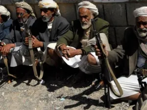 Elderly Yemeni tribesmen sit holding their weapons during a tribal ceremony in Khamer city, Amran governorate, 75 km north of the Yemeni capital Sanaa on January 22, 2008