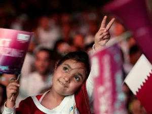 A Qatari girl celebrates in Doha after the tiny Gulf state was chosen to host the 2022 World Cup on December 2, 2010