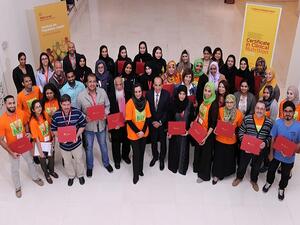 Dr. Ravinder Mamtani, Dr. Sohaila Cheema and participants holding their certificates in Clinical Nutrition.