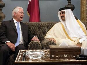 US Secretary of State Rex Tillerson (L) speaks with Qatar's Emir Sheikh Tamim bin Hamad Al-Thani in Doha on Tuesday, July 11, 2017. (AFP)
