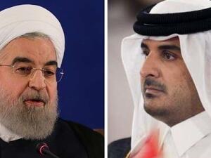 أمير دولة قطر تميم بن حمد آل ثاني والرئيس الإيراني حسن روحاني
