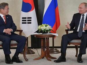  بوتين خلال لقاء مع نظيره الكوري الجنوبي مون جيه إن