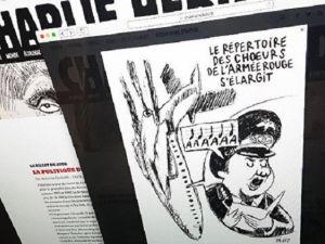  مجلة "شارلي إيبدو" تنشر رسوم كاريكاتورية عن كارثة طائرة "تو - 154" الروسية