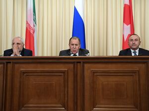 Russian Foreign Minister Sergei Lavrov (C), his Turkish counterpart Mevlut Cavusoglu (R) and Iran's Foreign Minister Mohammad Javad Zarif attend a news conference in Moscow on December 20, 2016. (AFP/Natalia Kalesnikova)