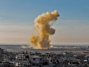 Smoke billows after an explosion on the Egyptian side of Rafah (AFP/File Photo)
