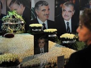 A woman visits the memorial for former Lebanese Prime Minister Rafik Hariri, who was assassinated in a car bomb explosion on Feb. 14, 2005. (AFP/File)