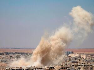 Smoke rises from an airstrike in Syria. (AFP)