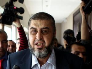 Khairat el-Shater leaves following a press conference in Cairo on April 9, 2012. Egyptian police arrested Shater, widely seen as the most influential Islamist politician behind deposed president Mohamed Morsi, an interior ministry general told AFP. (AFP file photo)